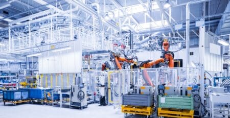 Manufacturing plant floor with lifts and assembly lines